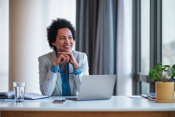 istock Relaxed african-american office worker, holding eyeglasses, taking a short break. 1432470690