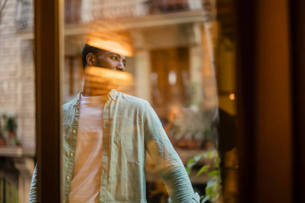 istock Reflection on the glass of an afro man 1432471989