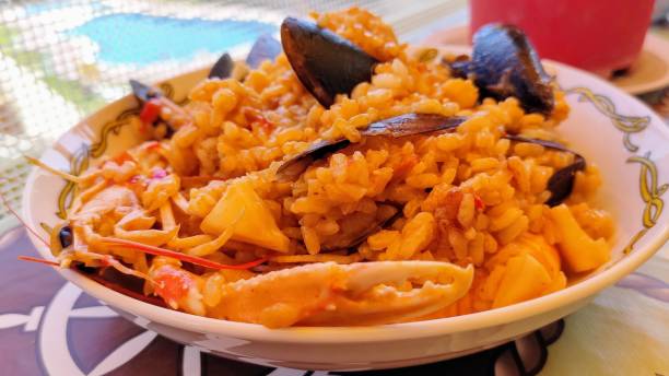 istock Typical spanish seafood paella in traditional pan 1432475600
