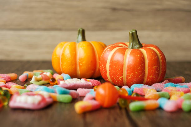 Halloween pumpkins on beige background. Digitally generated image. 3d render.