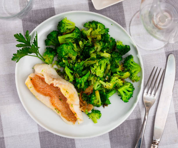 istock Appetizing fillet of gallineta with broccoli 1432477850