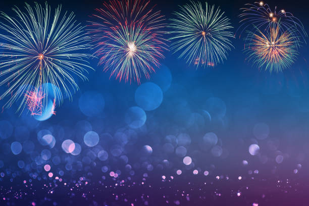 istock colorful fireworks on bokeh background 1432478243