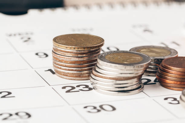 istock Macro shot of unrecognizable coins stacked close up 1432481217