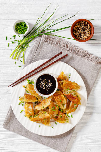 istock gyoza, wonton wrappers stuffed with pork, cabbage 1432481411