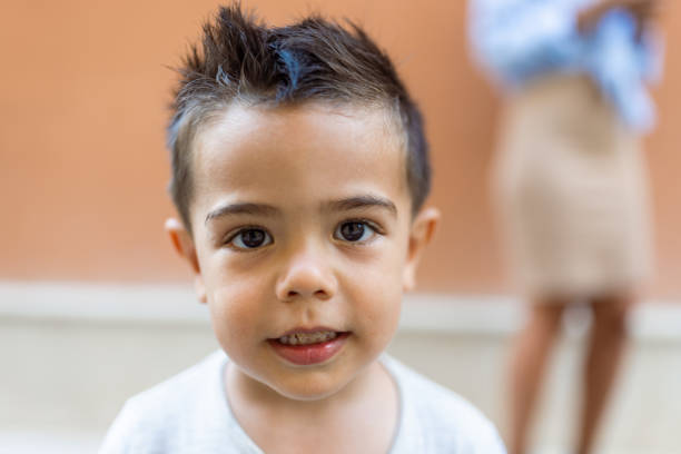 Cute little boy portrait. Close up, head and shoulders shot