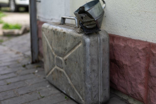 istock fuel canister and watering can 1432483574