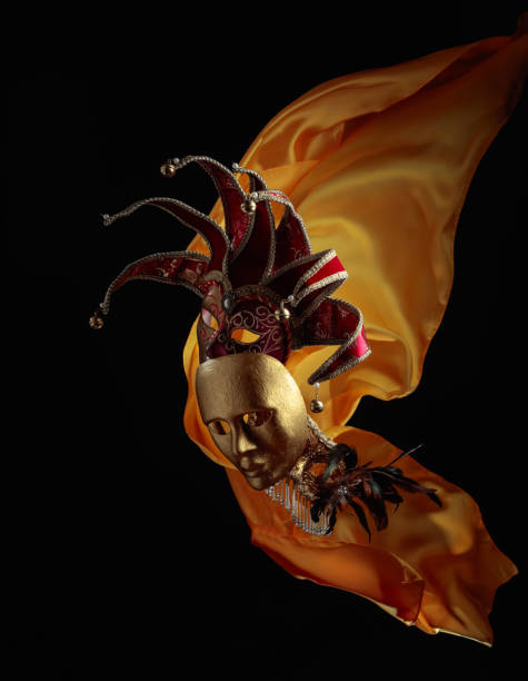 istock Old carnival masks with flutters yellow cloth. 1432484732