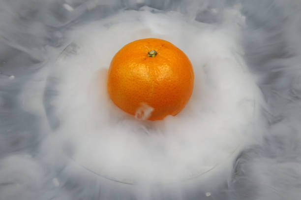 Freezing a tangerine in liquid nitrogen, haute cuisine.