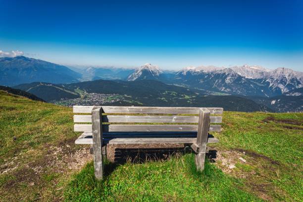 istock Wooden bench overlooking scenic mountains 1432485699