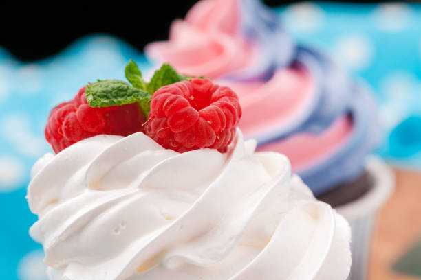 Side view of yummy cupcakes with assorted flavor. Shot on the table
