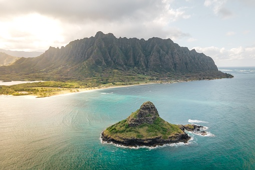 An aerial shot of the Mokoli'i islet in Hawaii during the sunset