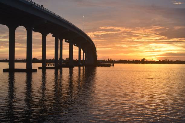 istock Beautiful bridge over water with a sunset view in the background 1432487237