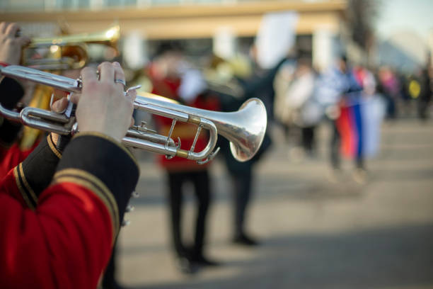 istock Orchestra with wind instruments. Trumpeters in ceremonial uniforms. 1432488929