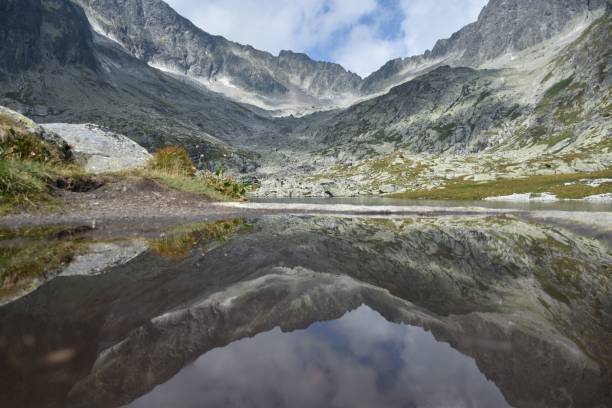 istock Clear lake with the reflection of the mountain 1432492461