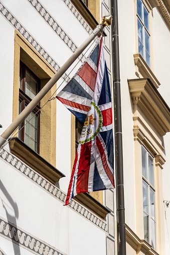 Bratislava, Slovakia: A Flag hanging above the British Embassy Door in Bratislava, Slovakia