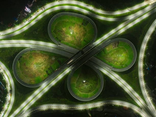 istock Aerial night view of a rounded highway 1432495896