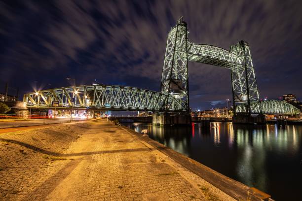istock The De Hef (Koningshaven Bridge) illuminated by lights at night in Rotterdam, Netherlands 1432497550