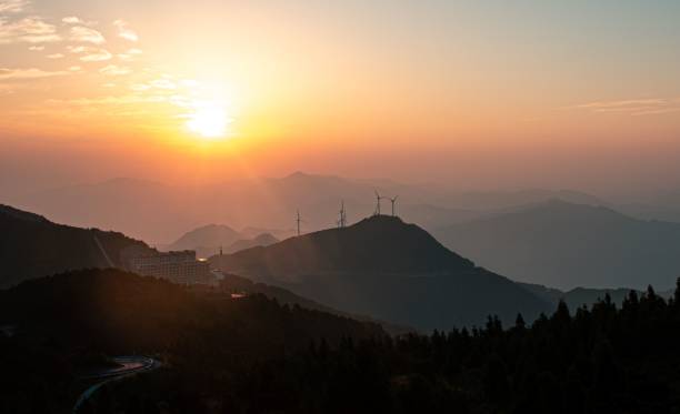 istock Aerial view of mountain landscape surrounded by growing dense trees during sunset 1432499188