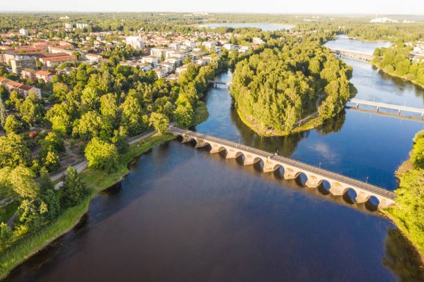 istock Bird's eye view of a river between residential areas 1432499318