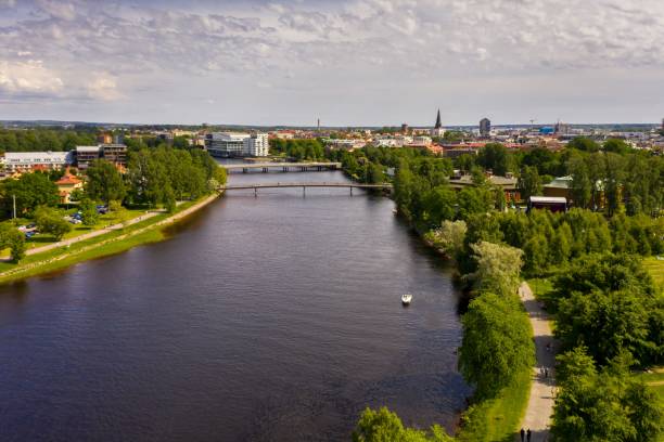 istock Bird's eye view of a river between residential areas 1432499407