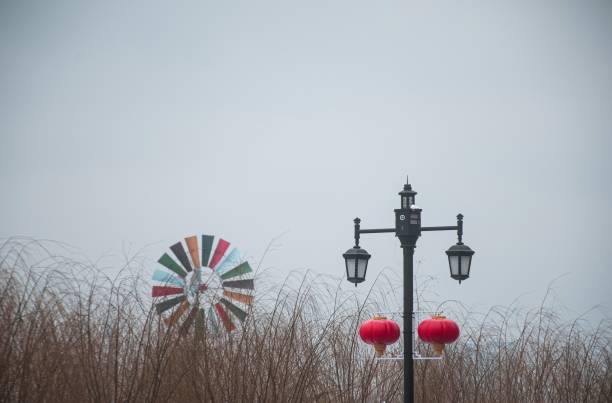 A lamp post and a colorful wind mill in Wuhan, China