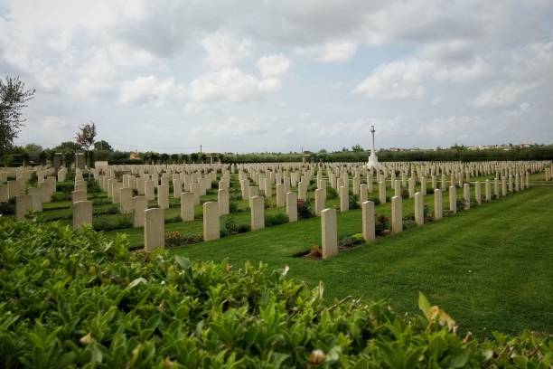 istock War cemetery with green lawn 1432501087