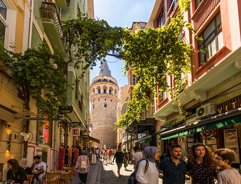Istanbul, Turkey: A beautiful view of the street with the view of the Galata tower in old Istanbul, Turkey.