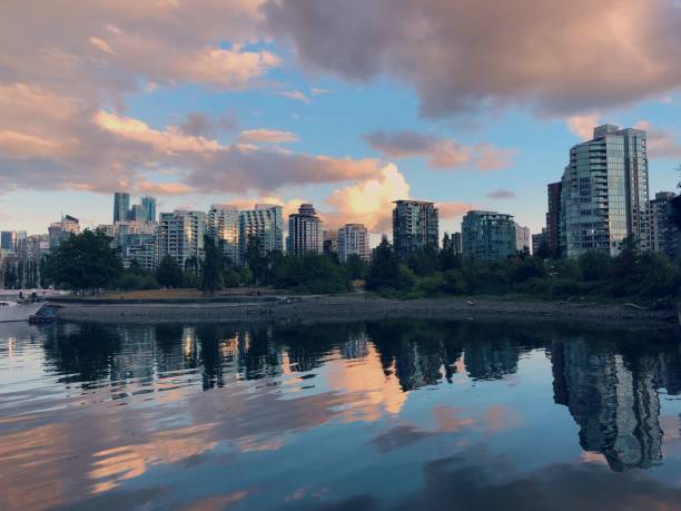 istock Vancouver skyline during pink cloudy sunset reflected in the lake 1432502776
