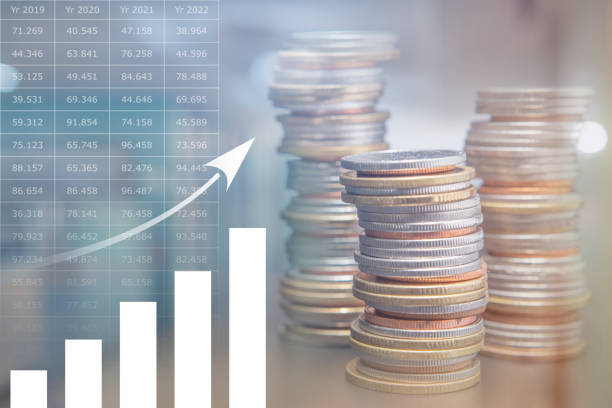 istock Double exposure stack of Thailand coins with profit graph 1432502814