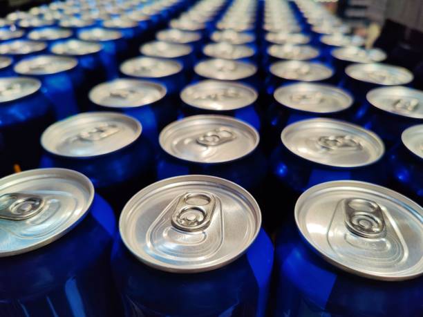 istock Blue soda can lined at the factory 1432503091