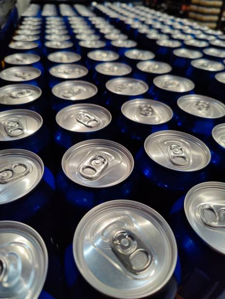 istock Blue soda can lined at the factory 1432503093