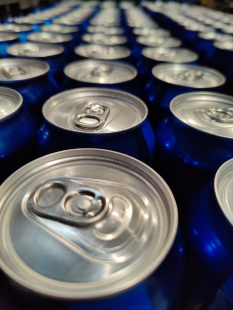 istock Blue soda can lined at the factory 1432503096