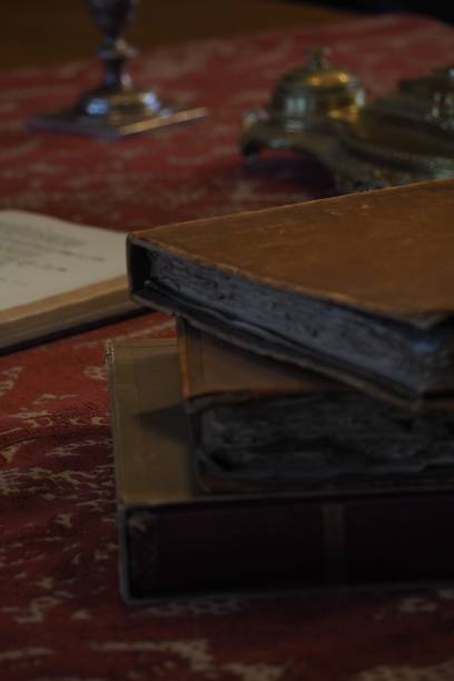 istock Vertical shot of stacked old books 1432506347