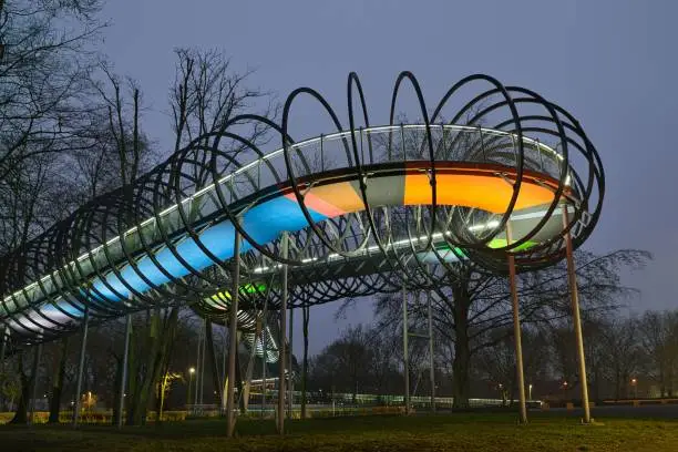 A beautiful shot of the Slinky Spring to Fame bridge in Oberhausen, Germany at dusk