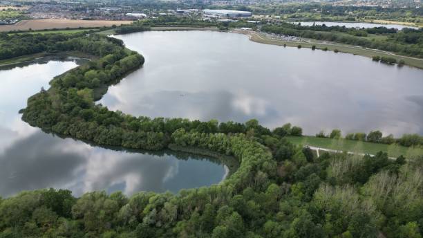 istock Aerial view of a lake separated by tree forest 1432507013