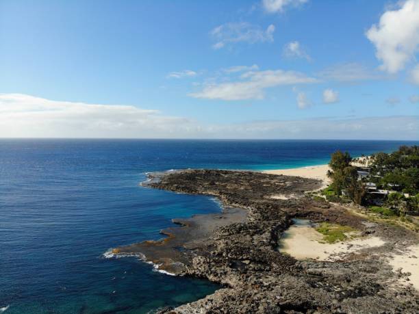 istock Aerial view a rocky coast on a sunny day 1432507758