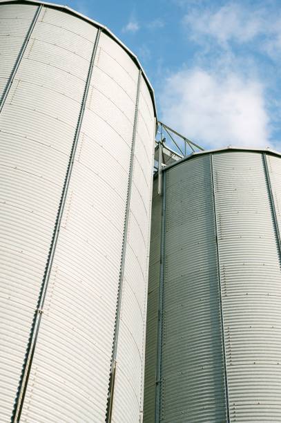 istock Low angle shot of silos for storage 1432508627
