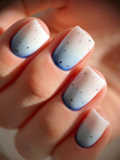 istock Vertical shot of a beautiful nail design on square nails 1432509965