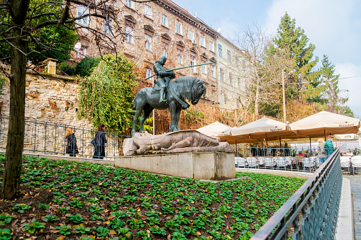 Zagreb, Croatia - December 10, 2020: The Square of the Croatian Dragon Brotherhood, Statue of St. George the dragon-slayer