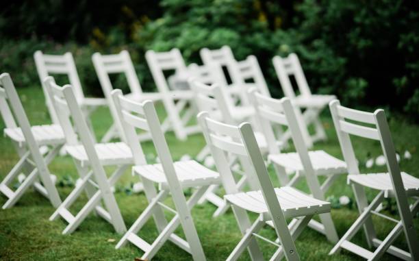 istock View of white chairs in a garden on a wedding day 1432512367