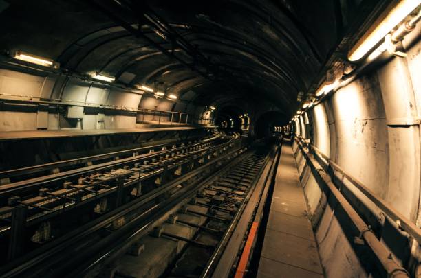 istock Dark tunnel in metro station with subway rails 1432515280
