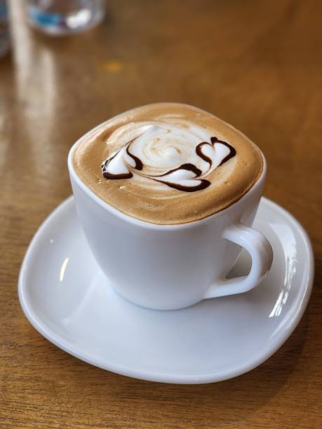 istock Closeup of a cup of cappuccino on a table 1432515324