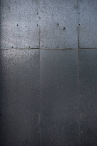 istock Metal plates, pieces of iron fastened with rivets. Image that can be used as a texture or background 1432515442