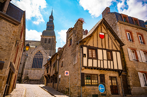 Dinan Rue Aute Voie and Basilique Sant-Sauveur french Bretagne Brittany picturesque town in France. Walled Breton town in the Côtes-d'Armor