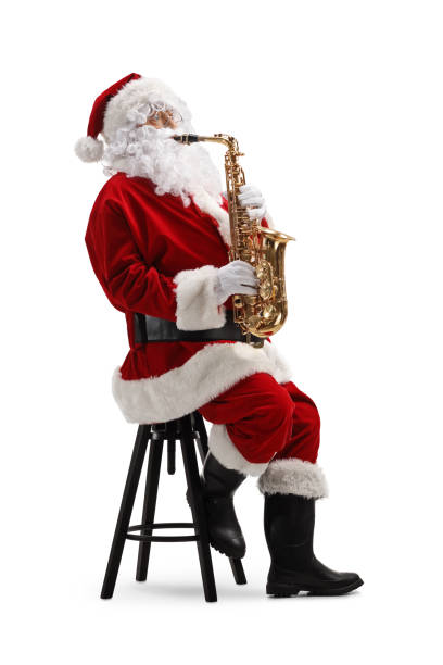 istock Santa claus sitting on a chair and playing a saxophone 1432517058