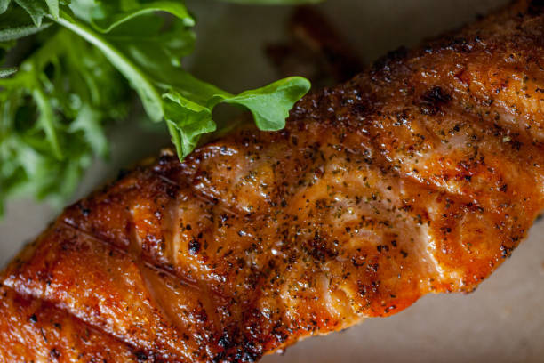 istock Grilled salmon with lemon, salad, on an oval plate. Horizontal orientation 1432518348