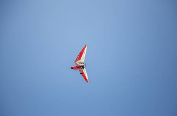istock An ultralight trike flying in the air 1432520360