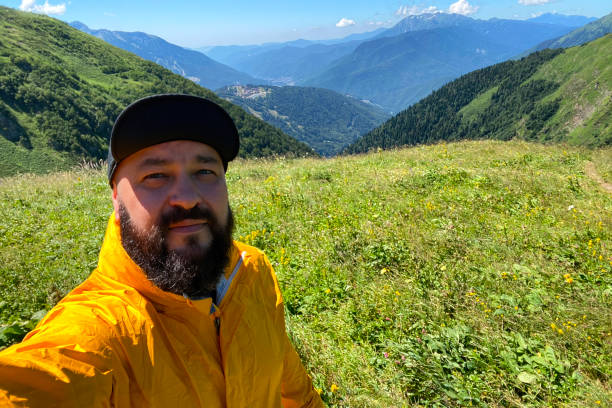 istock Hiker taking selfie in the Caucasus mountains 1432524147