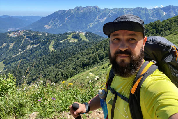 istock Hiker taking selfie in the Caucasus mountains 1432524208