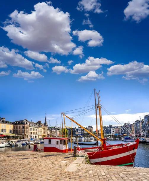 Honfleur city in Normandie or Normandy in France. In Calvados department on the southern bank of the estuary of the Seine with beautiful old port with slate-covered facades